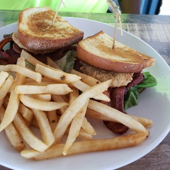 Waterfront Social - A BALT..... bacon avocado lettuce and tomato with fries! I think there was an onion ring in there but not sure. Applewood bacon too! - Bars Near Me - Crystal River, Florida Waterfront Social - A BALT..... bacon avocado lettuce and tomato with fries! I think there was an onion ring in there but not sure. Applewood bacon too! - Bars Near Me - Crystal River, Florida