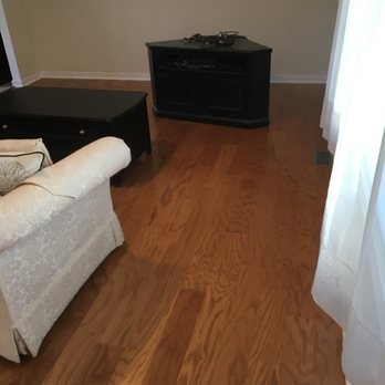 MC Remodeling - a living room with hardwood floors - Flooring Near Me MC Remodeling - a living room with hardwood floors - Flooring Near Me