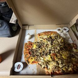 Vicario's Pizza - What's in this picture is a very good baked pizza It's the best pizza and logan County.