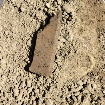 Topsoil Pros - a piece of brick laying on the ground - Landscaping Near Me - Morganville, New Jersey Topsoil Pros - a piece of brick laying on the ground - Landscaping Near Me - Morganville, New Jersey