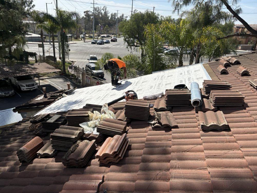 Slide of TopStamp Roofing