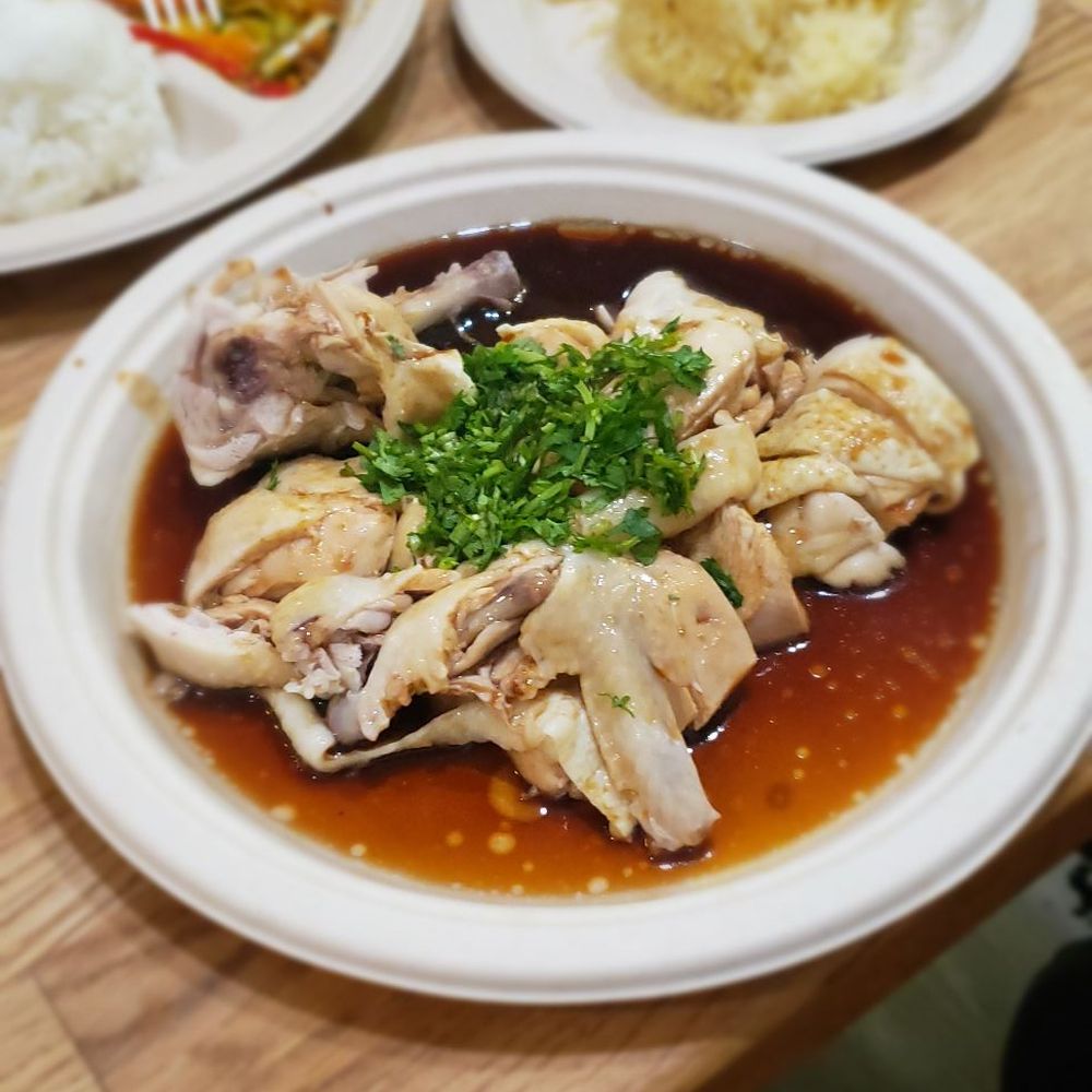 Sago - Haiwainese chicken with a side of garlic butter rice. - Malaysian Near Me - Cincinnati, Ohio Sago - Haiwainese chicken with a side of garlic butter rice. - Malaysian Near Me - Cincinnati, Ohio