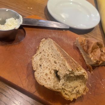 Saltgrass Steak House - Complimentary pumpernickel bread with honey butter - Steakhouses Near Me - Plano, Texas Saltgrass Steak House - Complimentary pumpernickel bread with honey butter - Steakhouses Near Me - Plano, Texas