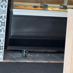 Kneaders Bakery and Cafe - Look at this gross floor under their front display case!!