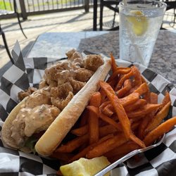 The Gem and Keystone Brewpub - Wifey catfish Po boy with sweet potato fries