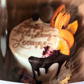 Delicious Designs - Carrot L'Orange Cake -  Traditional carrot cake with cinnamon and nutmeg filled with Orange zested buttercream icing - Bakeries Near Me - Reno, Nevada