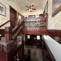 Booth T  Haley, DDS - Stairs leading to the front desk