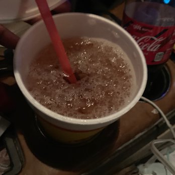 Chicken Express - a person pouring a drink into a cup - Chicken Wings Near Me - Seguin, Texas Chicken Express - a person pouring a drink into a cup - Chicken Wings Near Me - Seguin, Texas