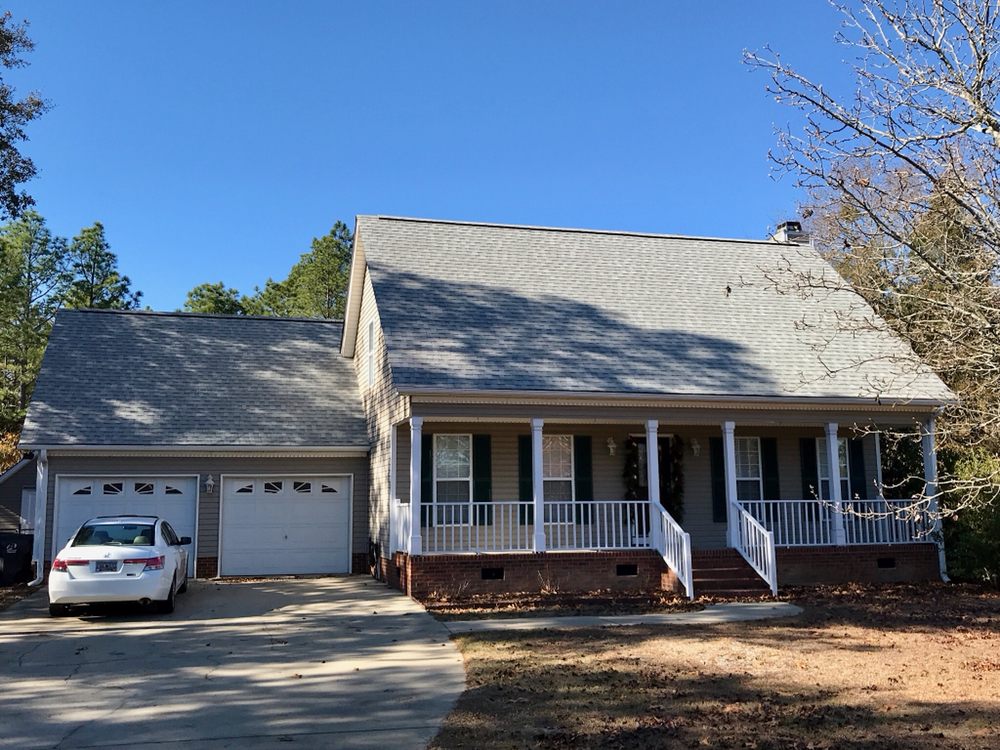 Slide of The Red Shirt Guys Roofing