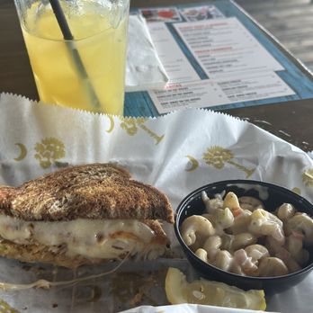 Pier 14 Restaurant & Lounge - Pier 14 Fish Rueben with Macaroni Salad & Juicy Loosey Goosey cocktail in the back. - Seafood Near Me - Myrtle Beach, South Carolina Pier 14 Restaurant & Lounge - Pier 14 Fish Rueben with Macaroni Salad & Juicy Loosey Goosey cocktail in the back. - Seafood Near Me - Myrtle Beach, South Carolina