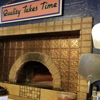 T-Bird Cafe - a pizza oven with a sign above it - Pizza Near Me - Peeples Valley, Arizona T-Bird Cafe - a pizza oven with a sign above it - Pizza Near Me - Peeples Valley, Arizona