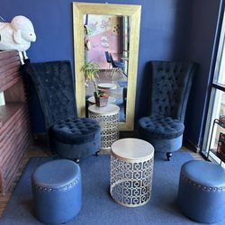 Cute corner with a tiny bookshelf on the side for toddlers. Perfect spot for mommy/daddy and tot.