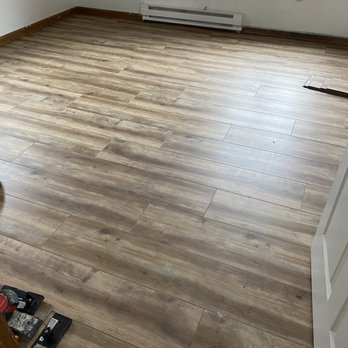 McCauley Flooring Installations - We installed this Luxury vinyl plank in this room. The flooring is water resistant, scratch resistant and very easy to maintain - Flooring Near Me