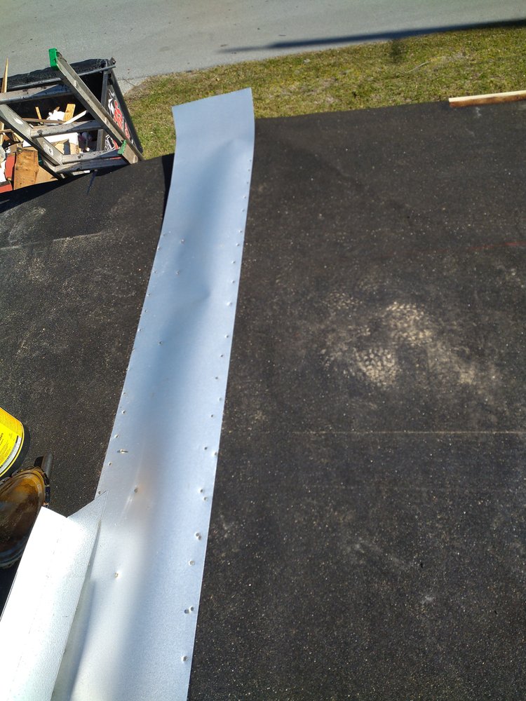 Slide of JAT Roofing