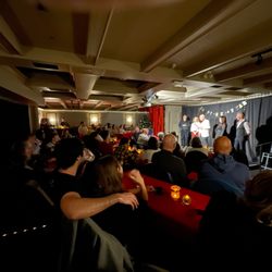 The Comedy Department - Speak-easy style cabaret seating.