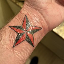 Lucky DeVille Tattoo - Star on both Wrist Tattoos.