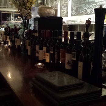 Stardust Cafe - Extensive wine selection lines the counter at Stardust Cafe. - American Near Me - Lewisburg, West Virginia Stardust Cafe - Extensive wine selection lines the counter at Stardust Cafe. - American Near Me - Lewisburg, West Virginia