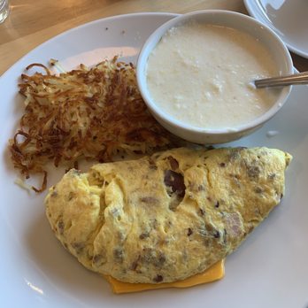 Eggsquisite Cafe - Cowboy omelette with a side of hash browns and grits - Breakfast & Brunch Near Me - Southlake, Texas Eggsquisite Cafe - Cowboy omelette with a side of hash browns and grits - Breakfast & Brunch Near Me - Southlake, Texas