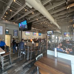 View of dining room from bar area. View of dining room from bar area.