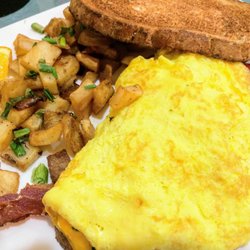 Kem's Restaurant & Lounge - Kem's Restaurant and Lounge Omelette breakfast - made to order, with potatoes and wheat toast