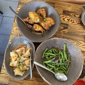 Dumpling Home - Dry Fried Chicken Wings, Dry Cooked Green Beans, Pork Dumplings with Sesame Sauce and Red Chili Oil - Dim Sum Near Me - San Francisco, California Dumpling Home - Dry Fried Chicken Wings, Dry Cooked Green Beans, Pork Dumplings with Sesame Sauce and Red Chili Oil - Dim Sum Near Me - San Francisco, California