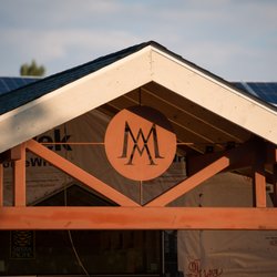 Mackintosh Academy - A welcome addition to our main building displays our school logo.