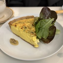 Quiche. Better than average custard texture, but lacked flavor. Salad dressing and mustard provided much need balance with a touch of acid.