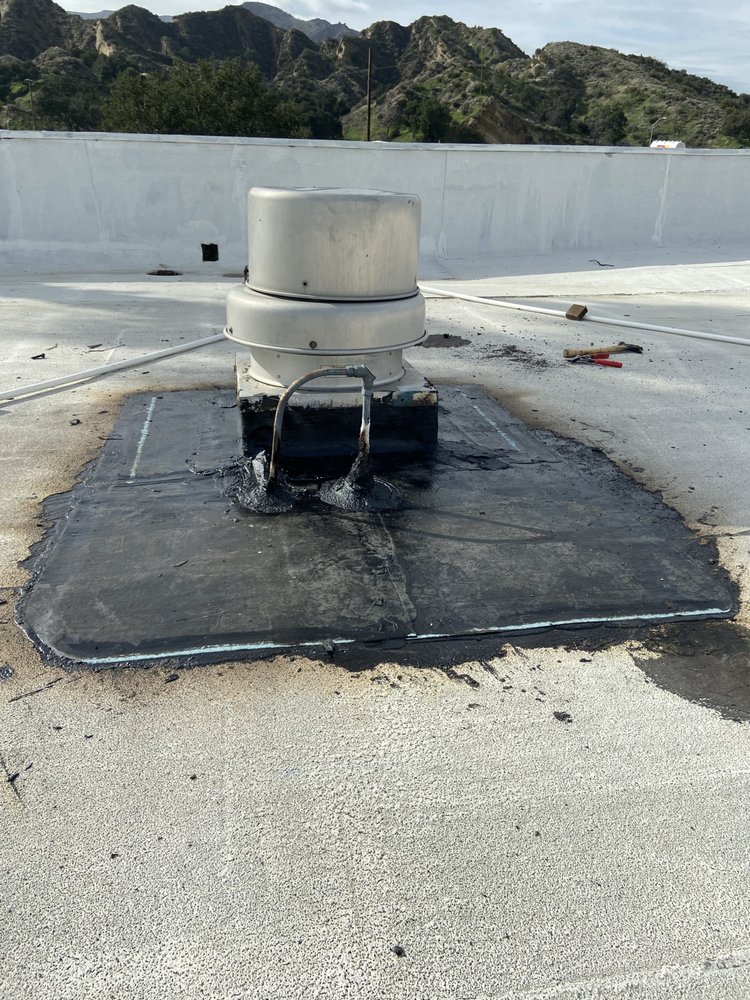 Slide of Mencho's Roofing & Repairs