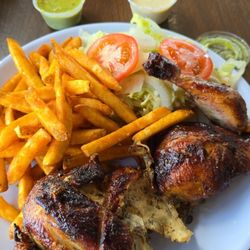 Pollos A La Brasa Fiesta - 1/2 chicken and fries.