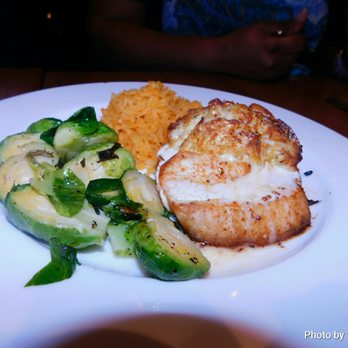 Bluestone Restaurant - Swordfish topped with crab and Saffron rice. And Brussels sprouts. - American Near Me - Timonium, Maryland Bluestone Restaurant - Swordfish topped with crab and Saffron rice. And Brussels sprouts. - American Near Me - Timonium, Maryland