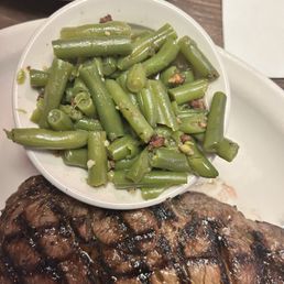 14 ounce ribeye medium rare seasoned perfectly w green beans 14 ounce ribeye medium rare seasoned perfectly w green beans