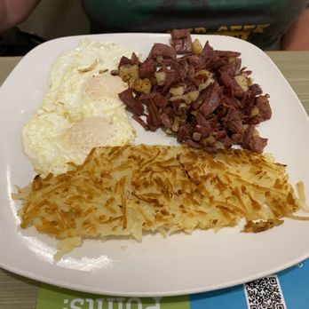 Jimmy's Egg - Corned beef hash and eggs with over-easy eggs cooked to perfection. - Breakfast & Brunch Near Me - Fayetteville, Arkansas Jimmy's Egg - Corned beef hash and eggs with over-easy eggs cooked to perfection. - Breakfast & Brunch Near Me - Fayetteville, Arkansas