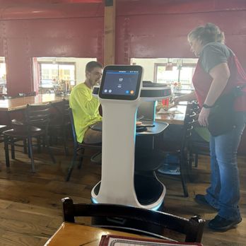Big Tex Bar-B-Que - Rowdy the Robot serving people across from us - Barbeque Near Me - Willcox, Arizona