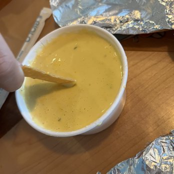 Cabo Bob's Burritos - Queso regular size - Mexican Near Me - Houston, Texas Cabo Bob's Burritos - Queso regular size - Mexican Near Me - Houston, Texas