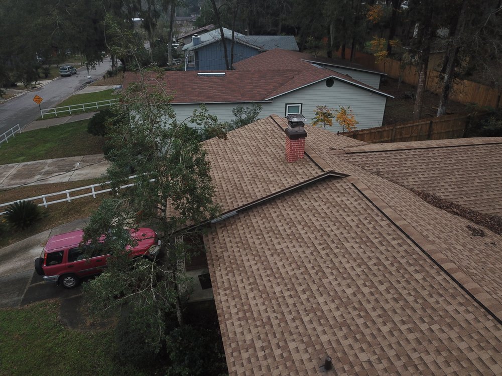 Slide of Action Roofing