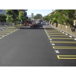 Ram Paving - Parking Lot Seal Coat and Striping Parking Spaces
