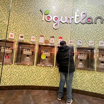 Yogurtland - Worker wiping down yogurt station In between customers - Ice Cream & Frozen Yogurt Near Me - Lake Forest, California Yogurtland - Worker wiping down yogurt station In between customers - Ice Cream & Frozen Yogurt Near Me - Lake Forest, California