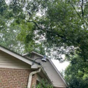 Live Green Tree Service - Before, large branch hanging over roof of the house/garage - Tree Services Near Me - Lilburn, Georgia Live Green Tree Service - Before, large branch hanging over roof of the house/garage - Tree Services Near Me - Lilburn, Georgia