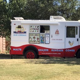 a white and red ice cream truck a white and red ice cream truck