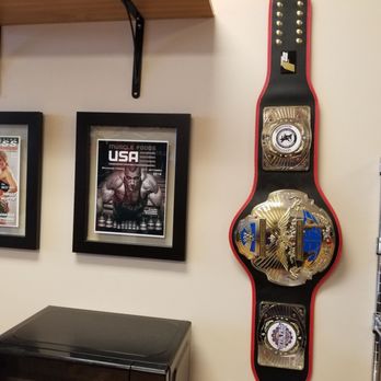 Fairfax Nutrition Corner - a boxing belt hanging on the wall - Health Markets Near Me - Fairfax, Virginia Fairfax Nutrition Corner - a boxing belt hanging on the wall - Health Markets Near Me - Fairfax, Virginia