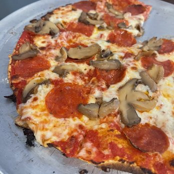 B.J. Ryan's -  a half eaten pizza - American Near Me - Norwalk, Connecticut