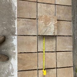 just sprinklers - A picture of the smaller stones already on the floor and then the second batch they gave us is sitting on top. We had to cut the remainder.