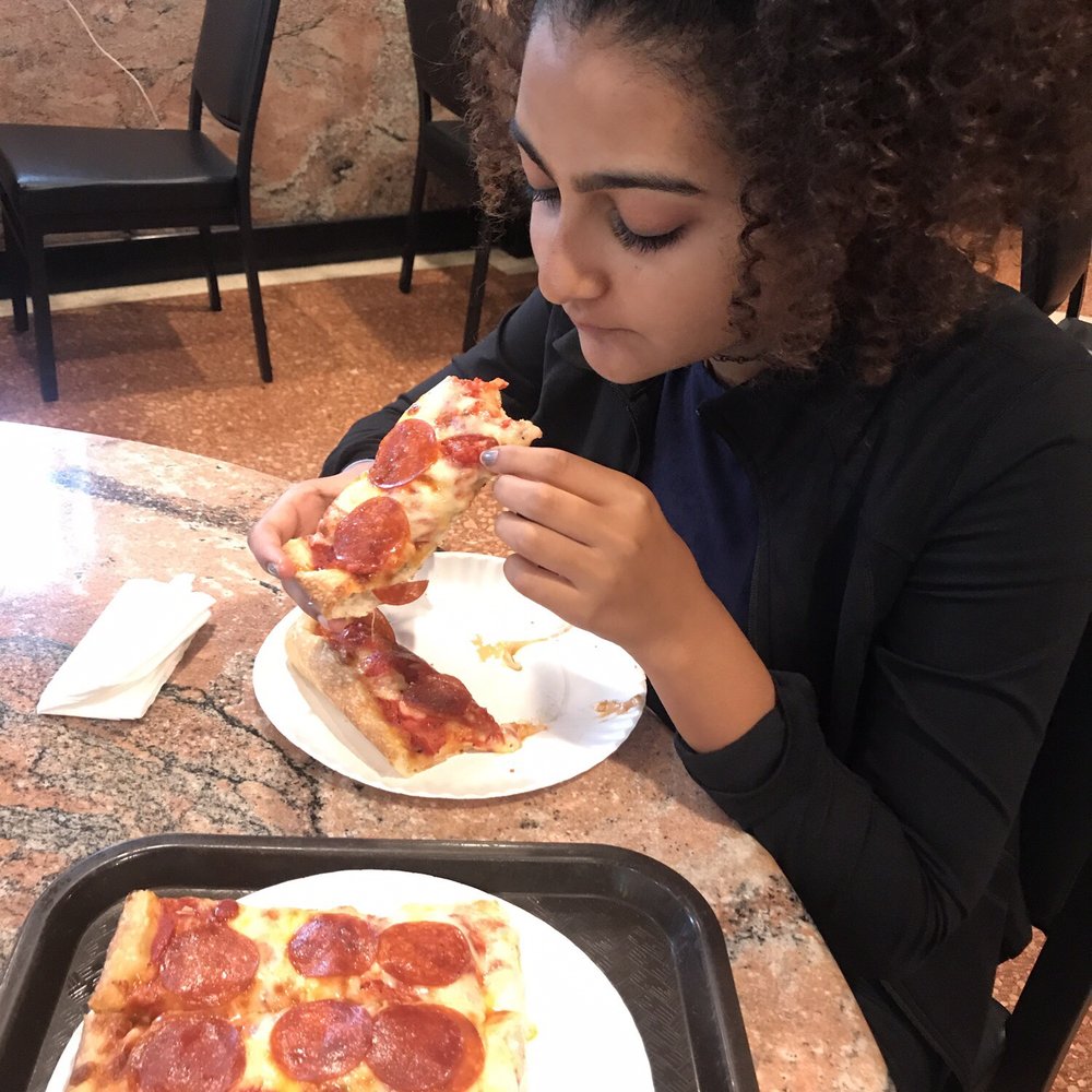 Aldo's Pizzeria & Restaurant - My gorgeous baby enjoying her last slice of nyc pie before we leave - Pizza Near Me - Ozone Park, New York Aldo's Pizzeria & Restaurant - My gorgeous baby enjoying her last slice of nyc pie before we leave - Pizza Near Me - Ozone Park, New York