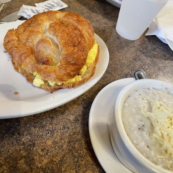 Goose Feathers Cafe & Bakery - Egg Croissant with bacon and cheese Grits. - Breakfast & Brunch Near Me - Savannah, Georgia
