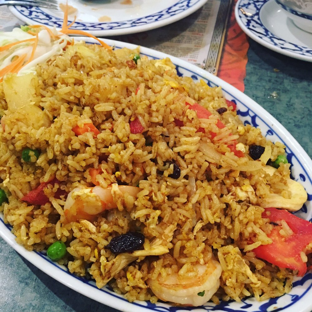 Thai House - Pineapple fried rice or the Thai House fried rice.. No tomato, onion, raisins, crab. - Thai Near Me - Las Vegas, Nevada Thai House - Pineapple fried rice or the Thai House fried rice.. No tomato, onion, raisins, crab. - Thai Near Me - Las Vegas, Nevada