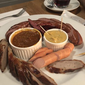 Wurst & Schnitzelhaus - WuSH - Large size wurst sampler plate - appetizer . Served with mustard and curry for dipping - German Near Me - Amsterdam, New Hampshire Wurst & Schnitzelhaus - WuSH - Large size wurst sampler plate - appetizer . Served with mustard and curry for dipping - German Near Me - Amsterdam, New Hampshire
