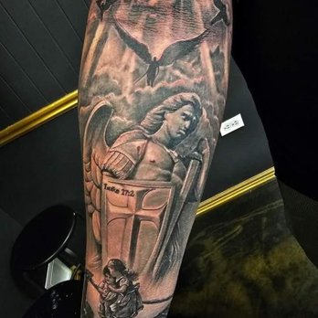 Latin Times Parlour - God's strongest Angel, St. Michael protects a little boy and a little girl against the evils in the world with his brothers. Luke 17:2 - Tattoo Near Me - Orem, Utah Latin Times Parlour - God's strongest Angel, St. Michael protects a little boy and a little girl against the evils in the world with his brothers. Luke 17:2 - Tattoo Near Me - Orem, Utah