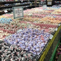 a display of candy in a grocery store a display of candy in a grocery store