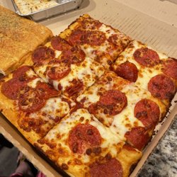Pizza Hut - This is supposedly extra cheese and pepperoni .