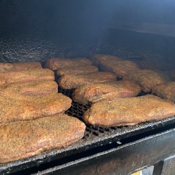 Terry Black's Barbecue - Brisket in the pit - Barbeque Near Me - Austin, Texas